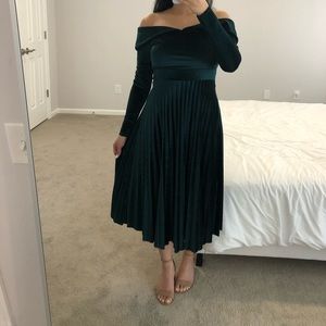 Emerald green velvet dress